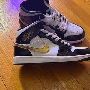 Nike Black and Gold Athletic Shoes